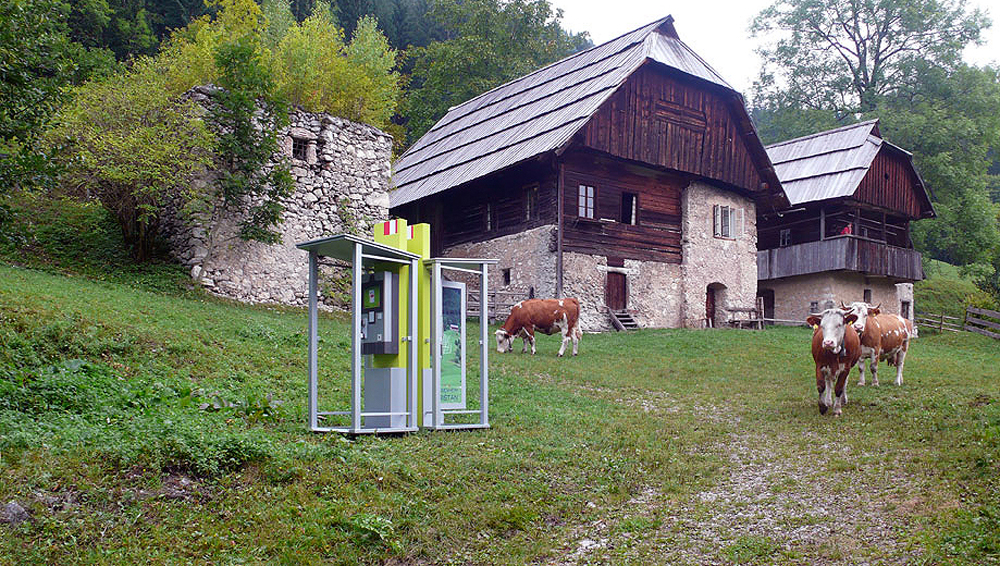 Art, artwork. A project entitled "Guggenheim Krištan" by Kruno Stipesevic and Nika Span / Nika Špan. Two telephone boxes with advertising panels. Material: Wood, paint, two prints, an internet page. Project: Trilateral project Klopfzeichnen/Colp/Potrkavanje 2009/10; Krištan Farm, Zell-Freibach/Sele-Borovnica, Austria